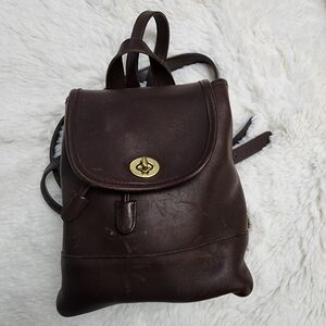 Brown Leather Backpack with Gold Clasp